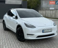 Белый Тесла Model Y, объемом двигателя 0 л и пробегом 42 тыс. км за 25999 $, фото 1 на Automoto.ua