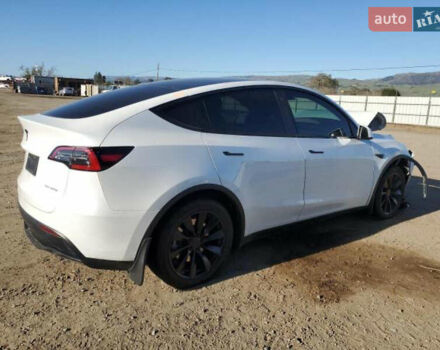 Белый Тесла Model Y, объемом двигателя 0 л и пробегом 52 тыс. км за 19800 $, фото 2 на Automoto.ua