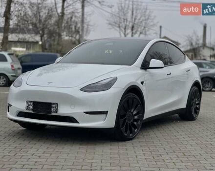 Білий Тесла Model Y, об'ємом двигуна 0 л та пробігом 27 тис. км за 28500 $, фото 1 на Automoto.ua