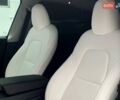 Белый Тесла Model Y, объемом двигателя 0 л и пробегом 49 тыс. км за 34999 $, фото 13 на Automoto.ua