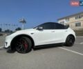 Белый Тесла Model Y, объемом двигателя 0 л и пробегом 82 тыс. км за 27500 $, фото 1 на Automoto.ua
