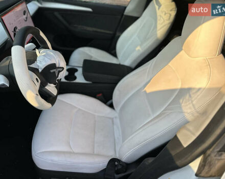 Тесла Model Y 2023 в Ровно на Automoto.ua Белый Тесла Model Y, объемом двигателя 0 л и пробегом 98 тыс. км за 17400 $, фото 10 на Automoto.ua