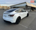 Белый Тесла Model Y, объемом двигателя 0 л и пробегом 24 тыс. км за 28999 $, фото 2 на Automoto.ua