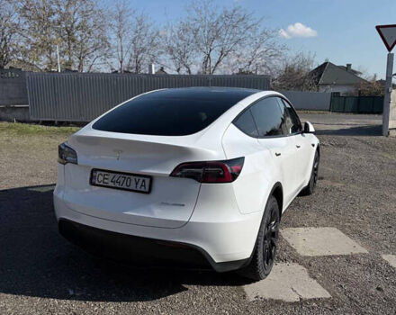 Білий Тесла Model Y, об'ємом двигуна 0 л та пробігом 23 тис. км за 28500 $, фото 6 на Automoto.ua