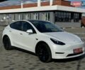 Белый Тесла Model Y, объемом двигателя 0 л и пробегом 58 тыс. км за 32490 $, фото 2 на Automoto.ua