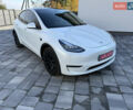 Білий Тесла Model Y, об'ємом двигуна 0 л та пробігом 49 тис. км за 24900 $, фото 1 на Automoto.ua