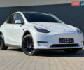 Білий Тесла Model Y, об'ємом двигуна 0 л та пробігом 52 тис. км за 24900 $, фото 1 на Automoto.ua