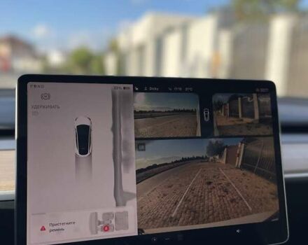 Белый Тесла Model Y, объемом двигателя 0 л и пробегом 26 тыс. км за 28700 $, фото 17 на Automoto.ua