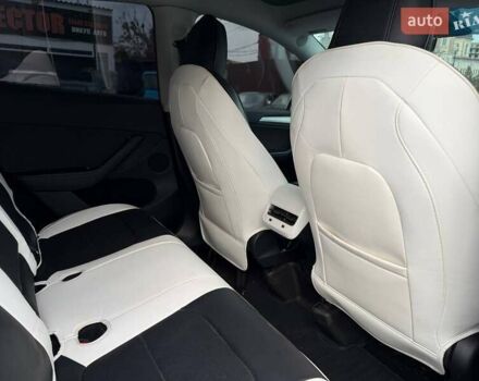 Белый Тесла Model Y, объемом двигателя 0 л и пробегом 53 тыс. км за 28800 $, фото 19 на Automoto.ua