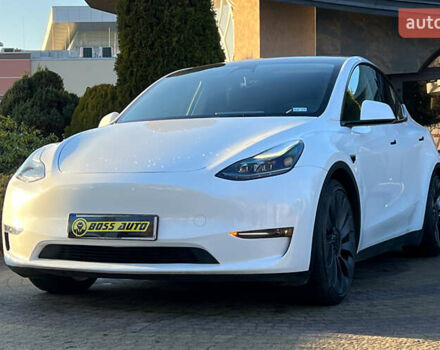 Білий Тесла Model Y, об'ємом двигуна 0 л та пробігом 73 тис. км за 27750 $, фото 2 на Automoto.ua