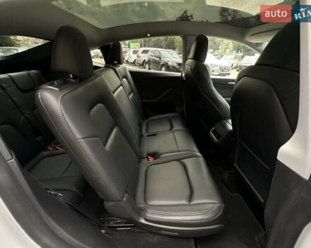 Білий Тесла Model Y, об'ємом двигуна 0 л та пробігом 47 тис. км за 26500 $, фото 59 на Automoto.ua