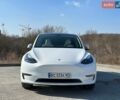 Белый Тесла Model Y, объемом двигателя 0 л и пробегом 26 тыс. км за 29000 $, фото 1 на Automoto.ua