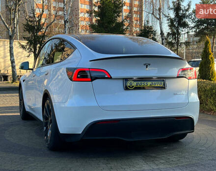 Білий Тесла Model Y, об'ємом двигуна 0 л та пробігом 73 тис. км за 27750 $, фото 4 на Automoto.ua