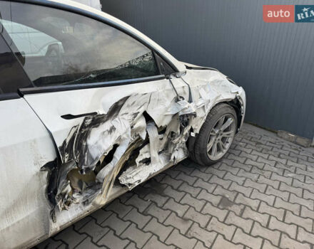 Білий Тесла Model Y, об'ємом двигуна 0 л та пробігом 156 тис. км за 17500 $, фото 2 на Automoto.ua