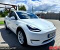 Білий Тесла Model Y, об'ємом двигуна 0.32 л та пробігом 50 тис. км за 26500 $, фото 1 на Automoto.ua