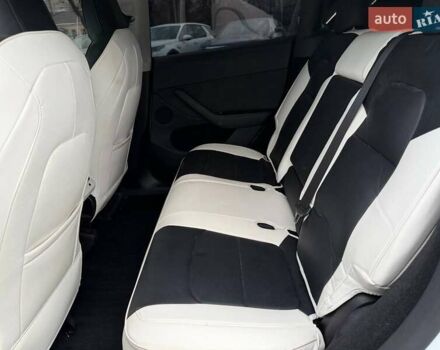 Белый Тесла Model Y, объемом двигателя 0 л и пробегом 53 тыс. км за 28800 $, фото 16 на Automoto.ua