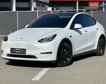 Білий Тесла Model Y, об'ємом двигуна 0 л та пробігом 53 тис. км за 25900 $, фото 1 на Automoto.ua