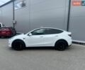 Белый Тесла Model Y, объемом двигателя 0 л и пробегом 51 тыс. км за 26999 $, фото 1 на Automoto.ua