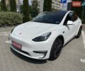 Белый Тесла Model Y, объемом двигателя 0 л и пробегом 52 тыс. км за 27800 $, фото 1 на Automoto.ua