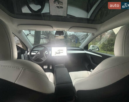 Білий Тесла Model Y, об'ємом двигуна 0 л та пробігом 84 тис. км за 28300 $, фото 10 на Automoto.ua