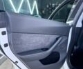 Белый Тесла Model Y, объемом двигателя 0 л и пробегом 93 тыс. км за 35500 $, фото 19 на Automoto.ua