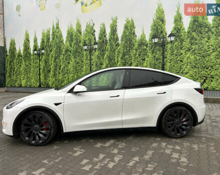 Білий Тесла Model Y, об'ємом двигуна 0 л та пробігом 84 тис. км за 28300 $, фото 1 на Automoto.ua