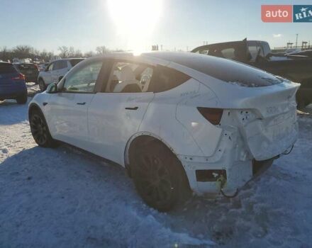 Белый Тесла Model Y, объемом двигателя 0 л и пробегом 25 тыс. км за 13000 $, фото 1 на Automoto.ua