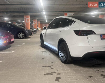 Белый Тесла Model Y, объемом двигателя 0 л и пробегом 87 тыс. км за 28999 $, фото 5 на Automoto.ua