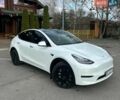 Білий Тесла Model Y, об'ємом двигуна 0 л та пробігом 49 тис. км за 27500 $, фото 1 на Automoto.ua