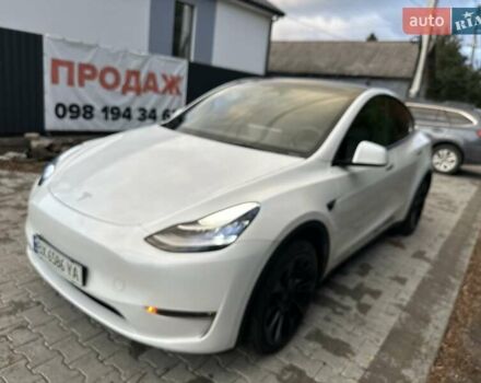 Белый Тесла Model Y, объемом двигателя 0 л и пробегом 62 тыс. км за 24999 $, фото 1 на Automoto.ua