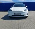 Білий Тесла Model Y, об'ємом двигуна 0 л та пробігом 66 тис. км за 28200 $, фото 1 на Automoto.ua