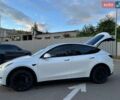 Білий Тесла Model Y, об'ємом двигуна 0 л та пробігом 65 тис. км за 28500 $, фото 16 на Automoto.ua