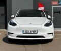Белый Тесла Model Y, объемом двигателя 0 л и пробегом 12 тыс. км за 28999 $, фото 1 на Automoto.ua
