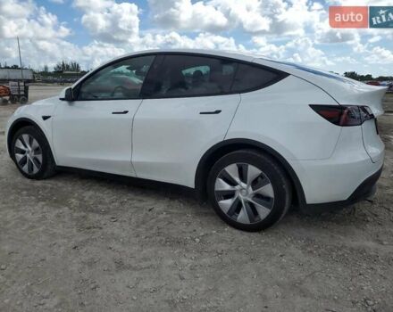 Белый Тесла Model Y, объемом двигателя 0 л и пробегом 77 тыс. км за 14000 $, фото 1 на Automoto.ua