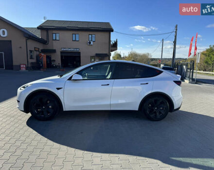 Белый Тесла Model Y, объемом двигателя 0 л и пробегом 26 тыс. км за 29900 $, фото 1 на Automoto.ua
