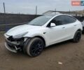 Белый Тесла Model Y, объемом двигателя 0 л и пробегом 52 тыс. км за 11000 $, фото 1 на Automoto.ua