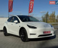 Белый Тесла Model Y, объемом двигателя 0 л и пробегом 26 тыс. км за 29900 $, фото 1 на Automoto.ua