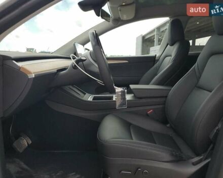 Белый Тесла Model Y, объемом двигателя 0 л и пробегом 77 тыс. км за 14000 $, фото 6 на Automoto.ua