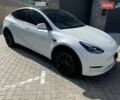 Белый Тесла Model Y, объемом двигателя 0 л и пробегом 80 тыс. км за 23000 $, фото 1 на Automoto.ua