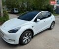 Белый Тесла Model Y, объемом двигателя 0 л и пробегом 51 тыс. км за 28500 $, фото 1 на Automoto.ua