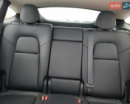 Белый Тесла Model Y, объемом двигателя 0 л и пробегом 77 тыс. км за 14000 $, фото 9 на Automoto.ua