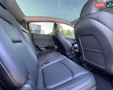 Белый Тесла Model Y, объемом двигателя 0 л и пробегом 23 тыс. км за 29999 $, фото 15 на Automoto.ua