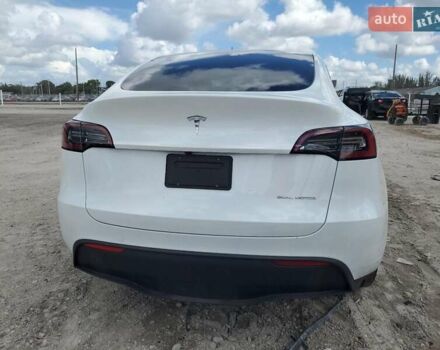 Белый Тесла Model Y, объемом двигателя 0 л и пробегом 77 тыс. км за 14000 $, фото 5 на Automoto.ua
