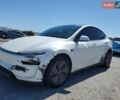 Белый Тесла Model Y, объемом двигателя 0 л и пробегом 9 тыс. км за 16000 $, фото 1 на Automoto.ua