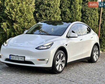 Білий Тесла Model Y, об'ємом двигуна 0 л та пробігом 100 тис. км за 20999 $, фото 1 на Automoto.ua