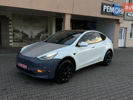 Білий Тесла Model Y, об'ємом двигуна 0 л та пробігом 187 тис. км за 18900 $, фото 1 на Automoto.ua