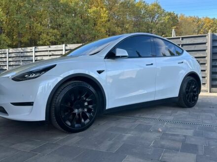 Белый Тесла Model Y, объемом двигателя 0 л и пробегом 80 тыс. км за 24599 $, фото 1 на Automoto.ua