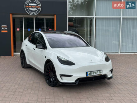 Белый Тесла Model Y, объемом двигателя 0 л и пробегом 84 тыс. км за 26000 $, фото 1 на Automoto.ua