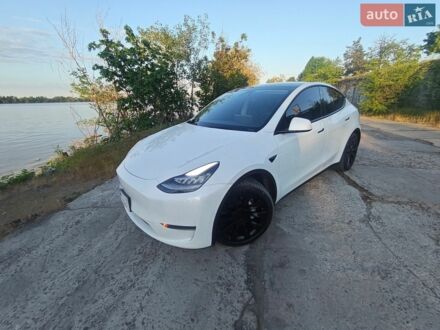 Білий Тесла Model Y, об'ємом двигуна 0 л та пробігом 106 тис. км за 23999 $, фото 1 на Automoto.ua
