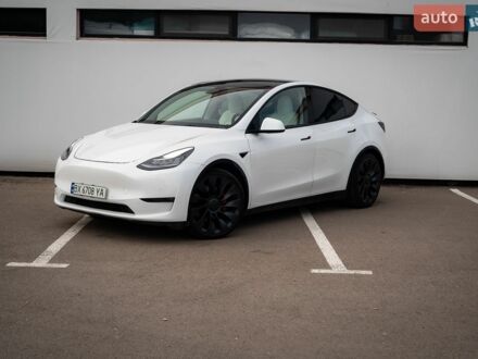Білий Тесла Model Y, об'ємом двигуна 0 л та пробігом 73 тис. км за 18500 $, фото 1 на Automoto.ua